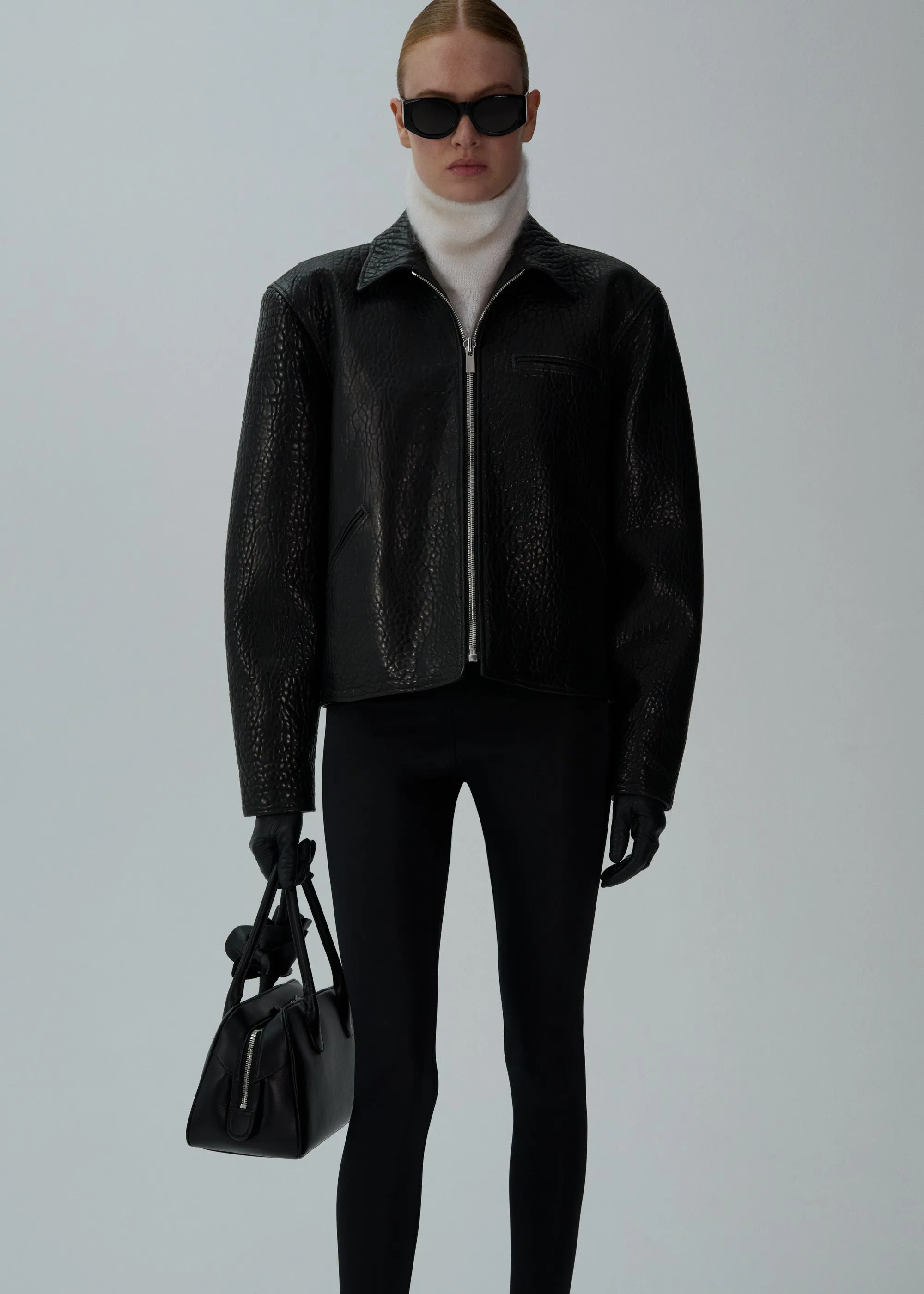 Boxy embossed leather zip jacket in black