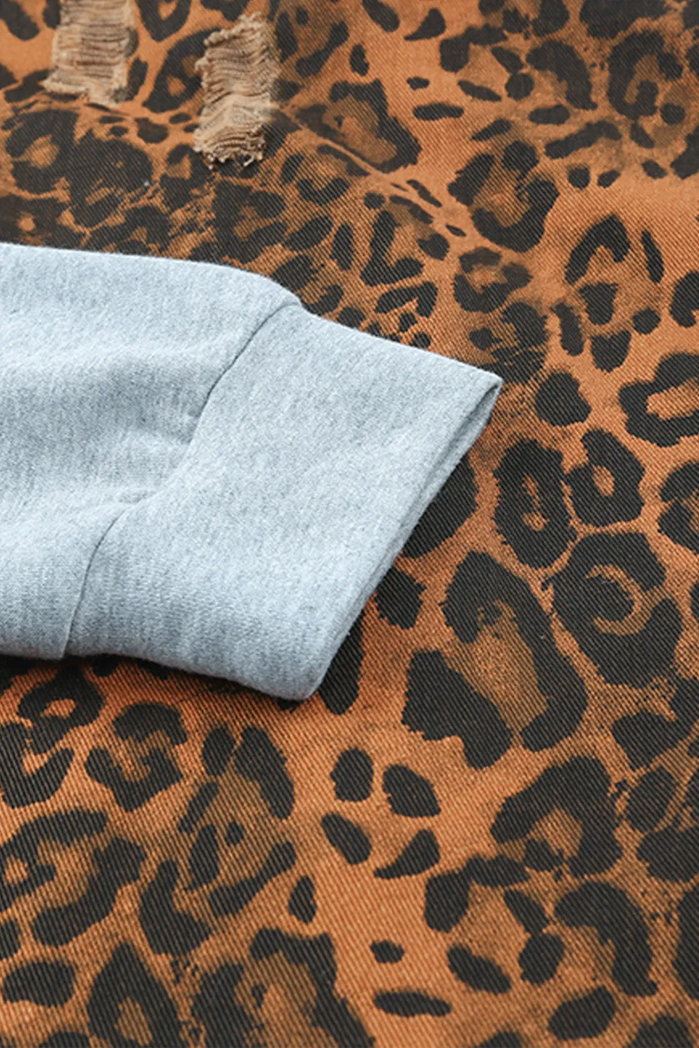 Wholesale Cheetah Patchwork Ripped Raw Hem Jacket